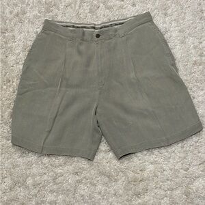 This is a pair of Tommy Bahama pleated 100% silk shorts in a light green